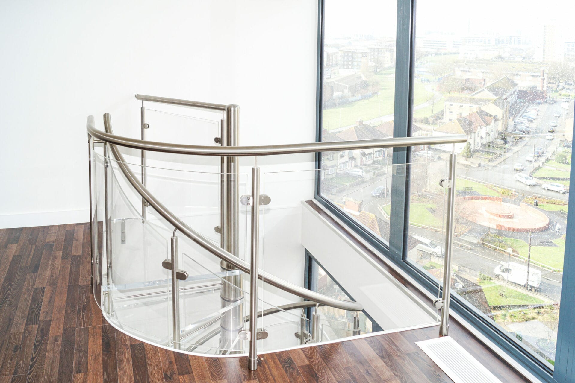 Penthouse spiral staircase glass treads
